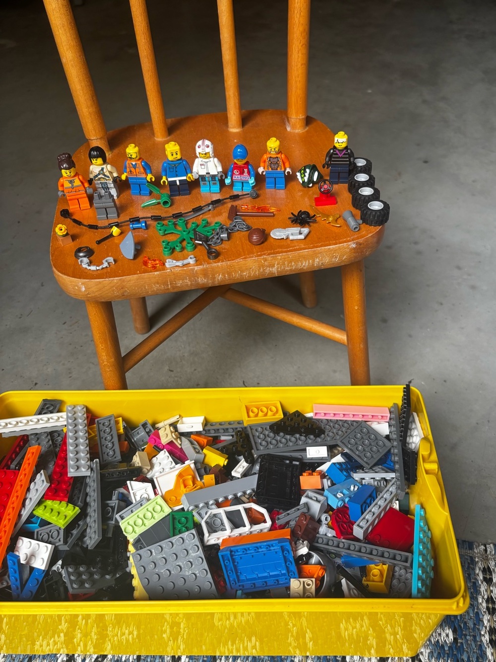 Legos with mini figures bin included chair is not 😂